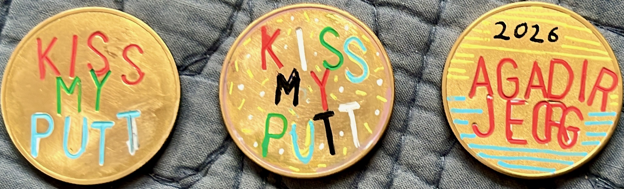 Kiss My Putt – three gold markers including custom Agadir
